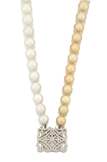 A two-colour South Sea cultured pearl and diamond two row choker necklace, composed of one row of slightly graduated white cultured pearls, diameters ranging from 12.2mm to 14.5mm, the second row of light bronze colour, diameters ranging from...