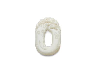 A white jade pendant plaque of coiled dragons