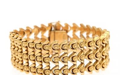 An 18k gold bracelet. L. 18.1 cm. W. 2.5 cm. Weight app. 38 g. Italy circa 1960–1970.