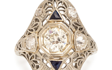 An Art Deco 18 Karat White Gold, Diamond and Synthetic Sapphire Ring