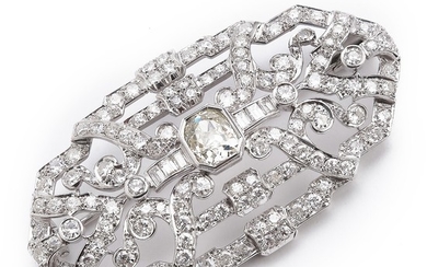 An Art Deco diamond brooch with an old-cut diamond weighing app. 2.00 ct. and old and baguette-cut diamonds totalling app. 6.00 ct., mounted in platinum.