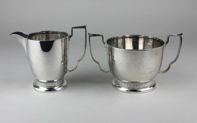 An Art Deco silver milk jug