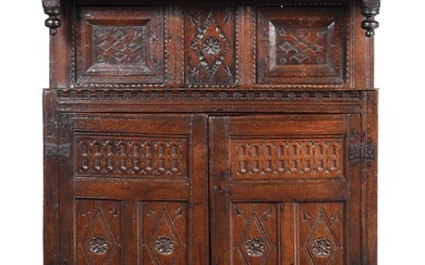 An Early British Charles II Carved Oak Court Cupboard