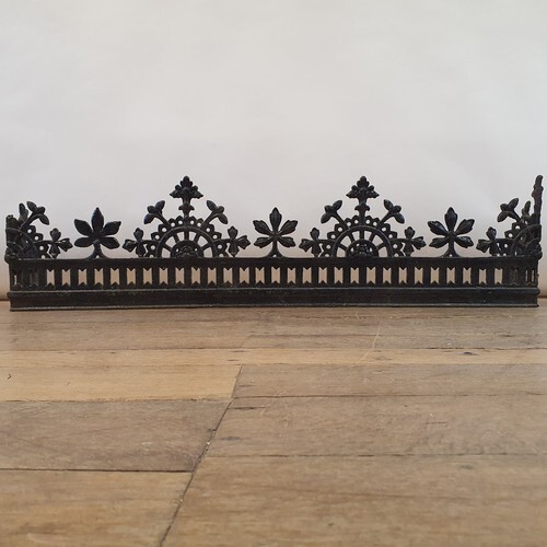 An early 20th century Aesthetic period style cast metal fend...