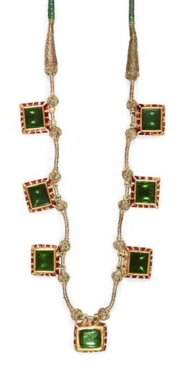 An early 20th century emerald set enamelled...