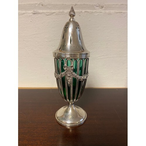 An early 20th century silver sifter, Birmingham 1919, with g...