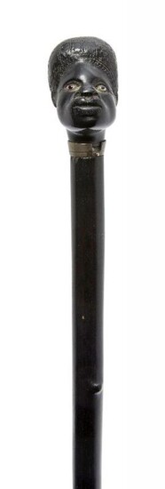 An ebony walking cane, late 19th/early 20th...
