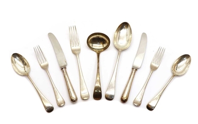 An eight place setting of Victorian Old English pattern silver flatware
