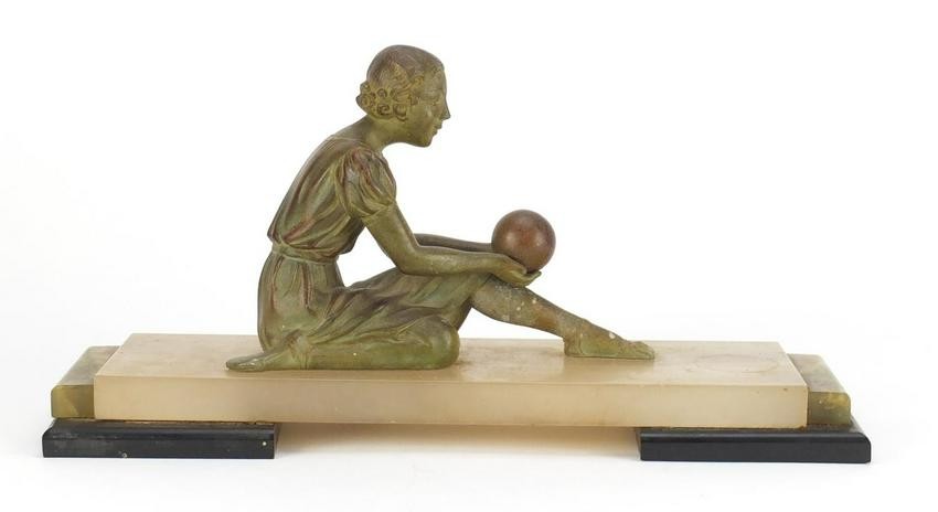 Art Deco bronzed sculpture of a female holding a ball