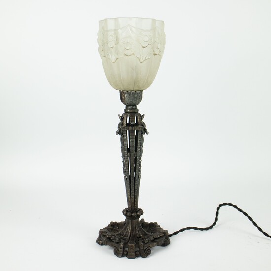 Art Deco table lamp with foot in patinated metal and a white glass shade