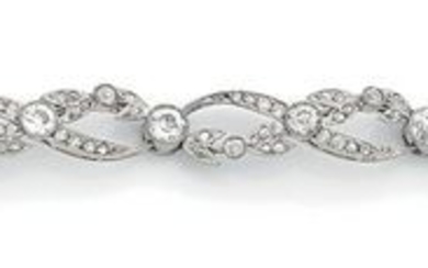 Articulated platinum bracelet (850) with a frieze of...