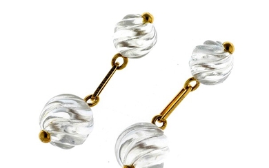 BOUCHERON. Paire de boutons de manchettes en or composés de deux perles de cristal gravé....