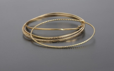 Bracelet with five 18k yellow gold rushes held by a ring (shocks).