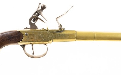 Brass flintlock pistol with double barrel, lockplate maker marked 'King,...