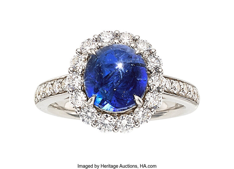 Burma Sapphire, Diamond, White Gold Ring The ring features...