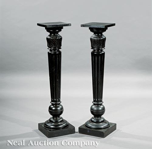 Carved and Ebonized Pedestals