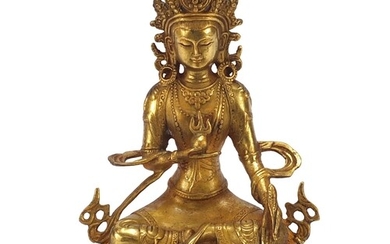 Chino Tibetan gilt bronze figure of seated buddha, 20cm high