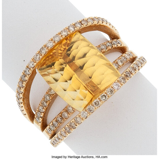 Citrine, Diamond, Gold Ring The ring features a cushion-shaped...