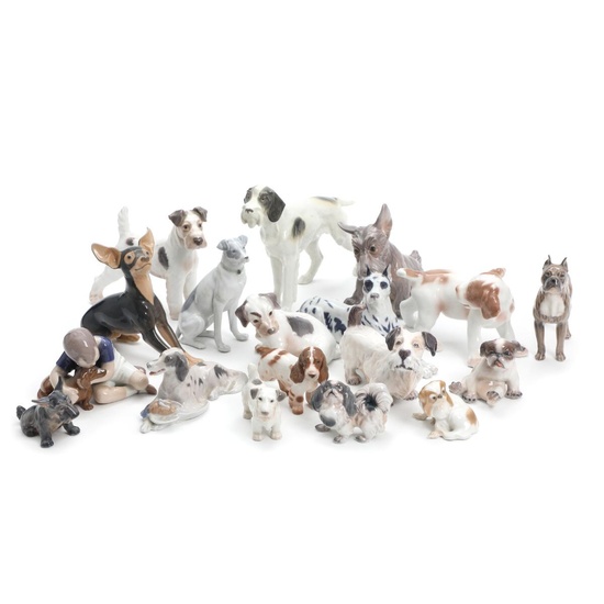 Collection of 18 porcelain dogs, decorated in underglaze colours. Dahl-Jensen, B&G, Royal...