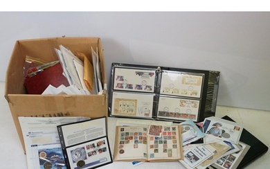 Collection of coins and stamps to include an album of world ...