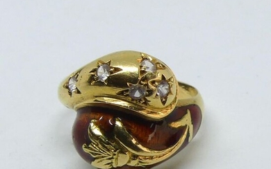 Crossed ring in partially enamelled yellow gold with white stone highlights. Gross weight 7,6 g. With control charge