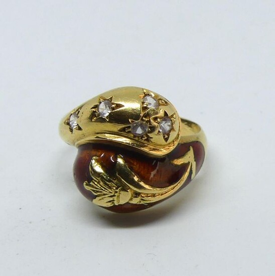 Crossed ring in partially enamelled yellow gold with white stone highlights. Gross weight 7,6 g. With control charge