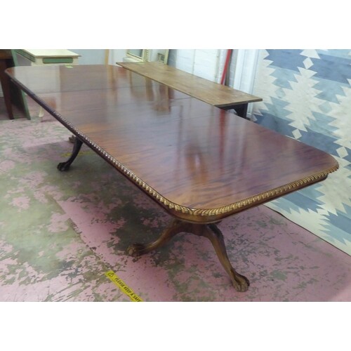 DINING TABLE, Chippendale design mahogany extending with a c...