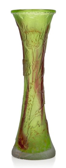 Daum (Est. 1879), a cased and acid-etched glass vase, c.1895, gilt signature Daum Nancy with Cross of Lorraine, The elongated vase flared at the neck and base, acid-etched in relief with thistles and leaves, some traces of gilding to the...