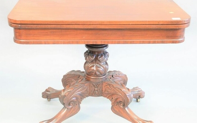 Empire mahogany card table, carved pedestal base on