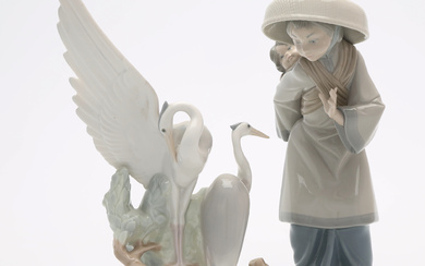 FIGURINES, a couple, mother with child, cranes, porcelain, Lladro.