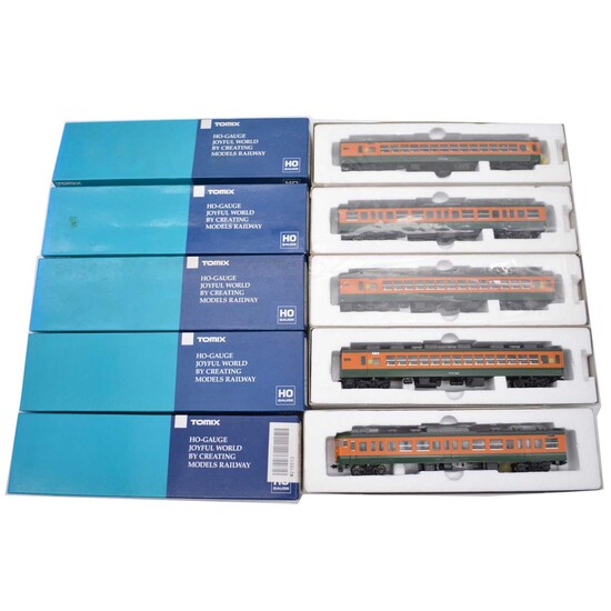 Five Tomix HO gauge model railway passenger coaches