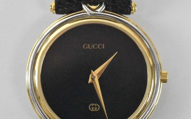 GUCCI; a gentleman's wristwatch with black dial, diameter excluding winding...