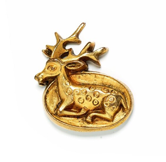 Gilt metal brooch representing an elongated deer signed on the back "INGRAND"