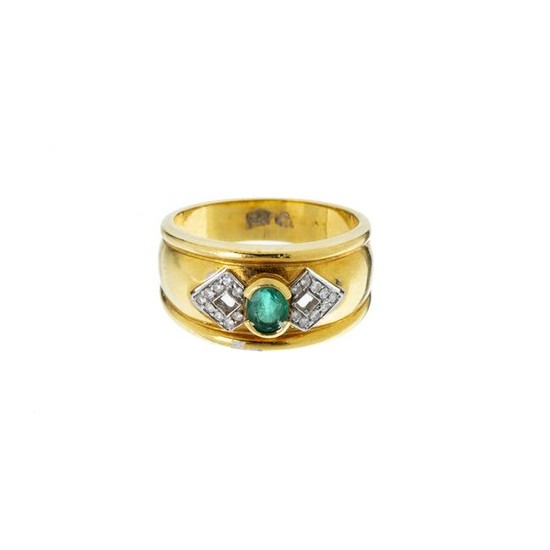 Gold ring with diamonds and emerald