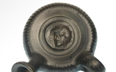 Greek Blackware Guttus with Head of Medusa, c. 4th