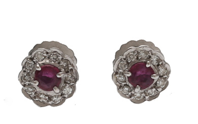 H. STERN. Rubies and diamonds rosette earrings.