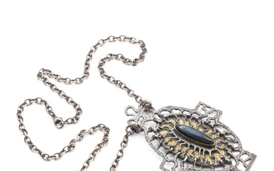 Helga Exner: A labradorite necklace set with cabochon-cut labradorite and gold leaf, mounted in oxidated sterling silver. Pendant L. 8.8 cm. Necklace L. 54 cm.