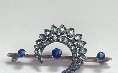 Late Victorian diamond and sapphire cresent bar brooch. Thre...