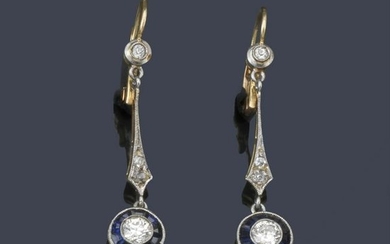 Long earrings with diamonds and calibrated sapphires in