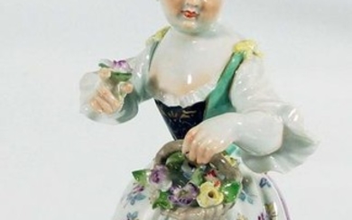 Meissen porcelain figure of girl with flower basket