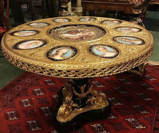 Napoleon lll gilt bronze mounted Ebonized wood with Sevres Style porcelain mounted center table