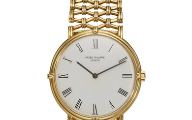 PATEK PHILIPPE, REF. 3821/1, A FINE AND RARE 18K YELLOW GOLD BRACELET WATCH