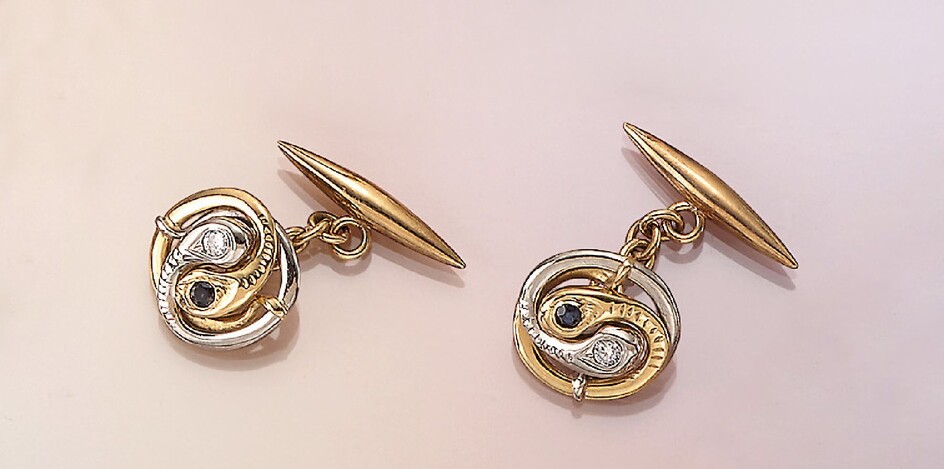 Pair of 18 kt gold cufflinks with sapphires...