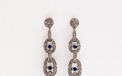Pair of 18k yellow gold and silver earrings...