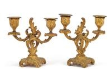 Pair of Rococco gilt metal two branch candlesticks