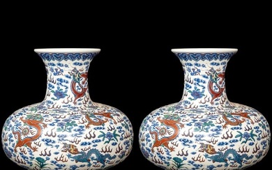 Pair of blue and white dragon pattern Bi Qi vase, 20th century