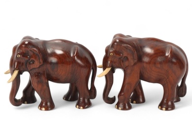 Pair of early 20th century carved hardwood elephants, height...