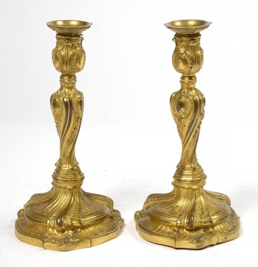 Pair of gilt bronze Regency style torches. Carrying...