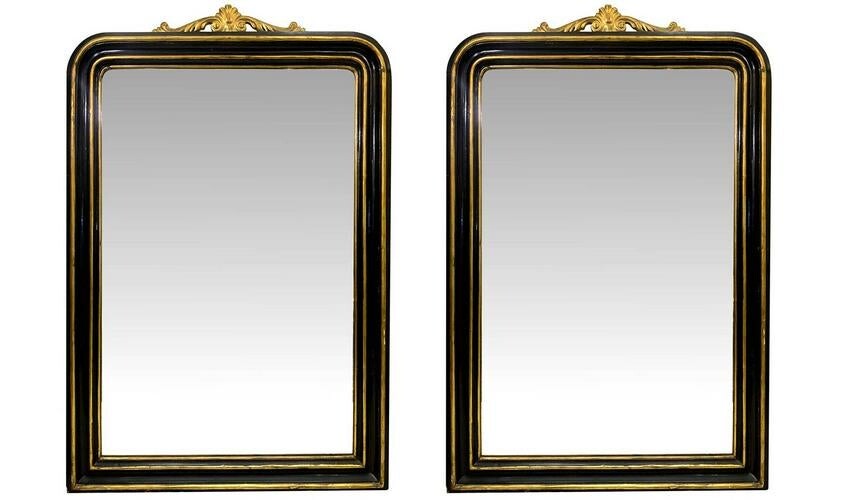Pair of mirrors with black ebonized wood trims and