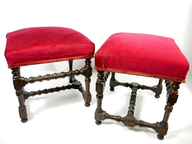 Pair of turned wooden stools, the seats upholstered in red velvet.